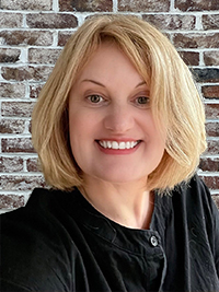 A woman in a black dress