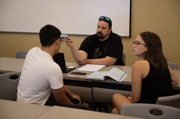 Business students collaborating in classroom