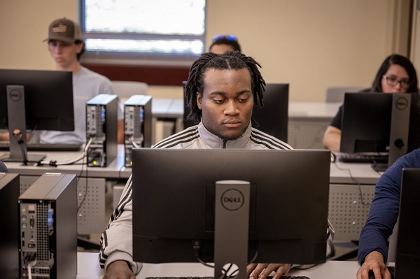 Student at Computer in Classroom