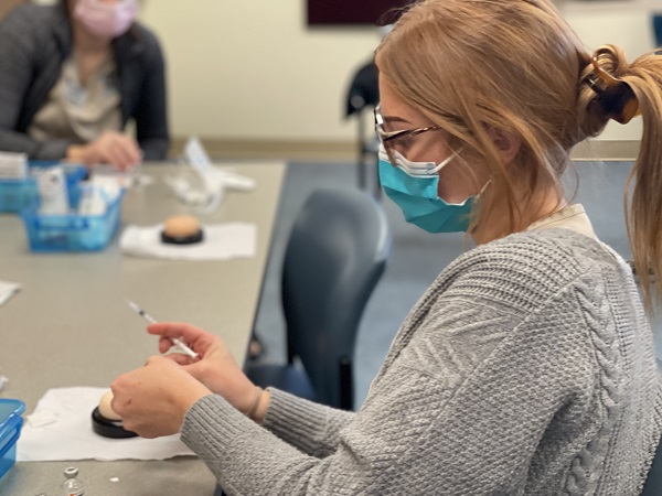 Nursing Student Practicing Shot