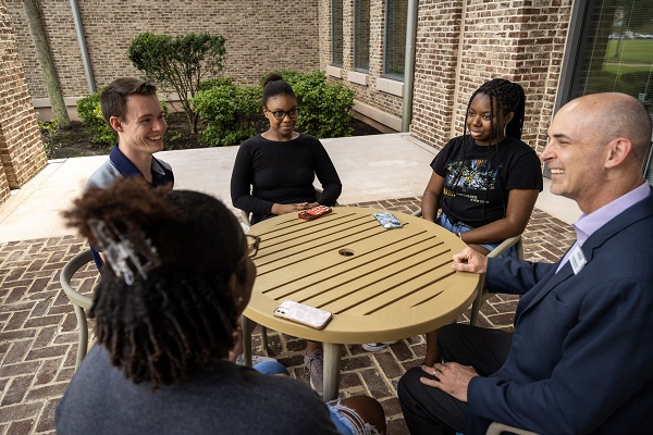 Provost at Table with Students