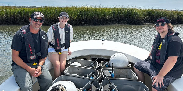 students on research boat