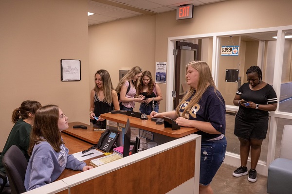 Students at Housing Desk