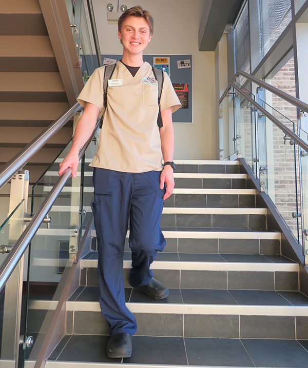 student_on_library_stairwell