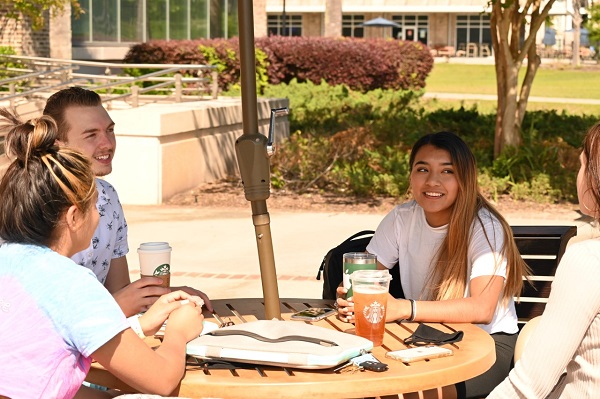 Students Sitting with Coffee