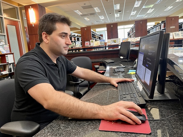 Community Member Using Library Computer