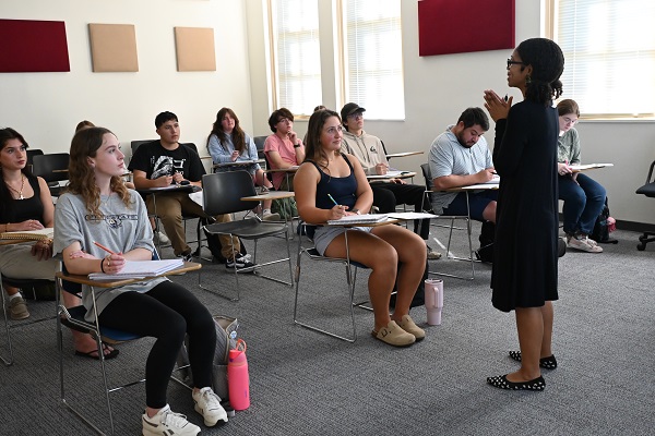 Dr. Morgan header photo teaching a class