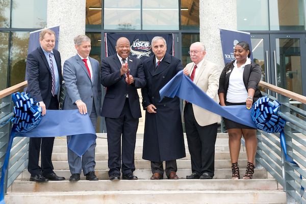 Big blue ribbon cutting 