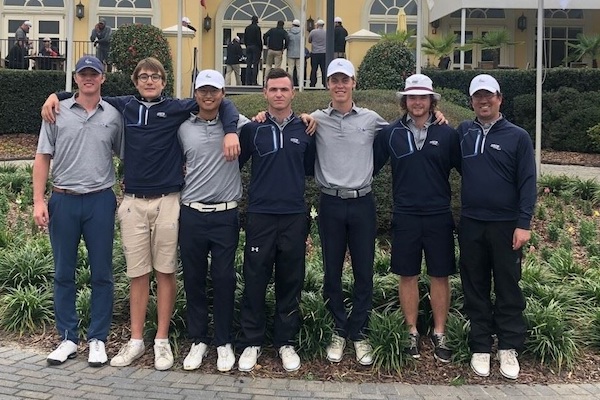 Golfers standing in a group
