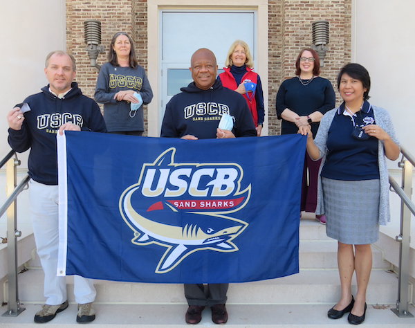 (Left to right, front row) Dr. Bud Sanders, Chancellor Al M. Panu, Dr. Juanita Babet Villena-Alvarez (Back row) Dr. Cindy Lahar, Dr. Lynn McGee and Dr. Kimberly Cavanagh (Left to right, front row) Dr. Bud Sanders, Chancellor Al M. Panu, Dr. Juanita Babet Villena-Alvarez (Back row) Dr. Cindy Lahar, Dr. Lynn McGee and Dr. Kimberly Cavanagh