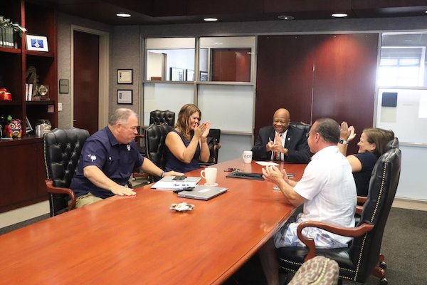 Quin Monahan, Director of Athletics, Genia Montford, Associate Director of Athletics / Senior Woman Administrator, Dr. Al Panu, USCB Chancellor, Betsy Walters, Director of Athletic Compliance, and Mitchell Migel, Director of Sports Information after receiving the acceptance call. 