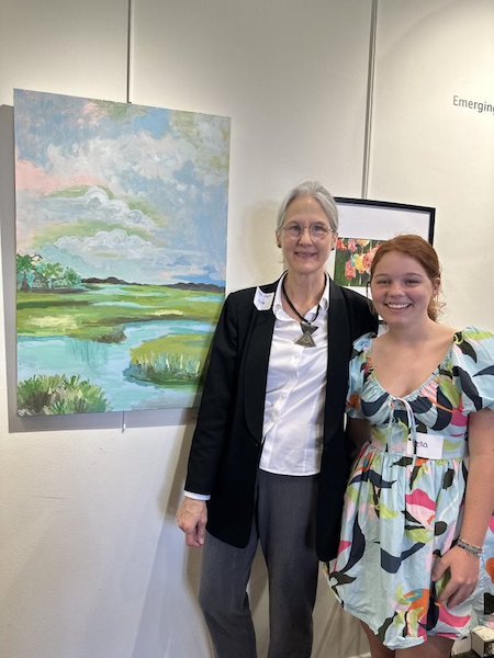 Dr. Angelle with the Winner of the event Dr. Angelle with the Winner of the event