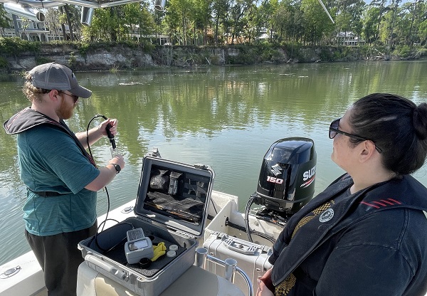 Patrick Jones sampling water