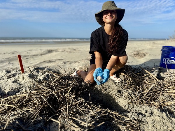Student holding Loggerhead egg Student holding Loggerhead egg