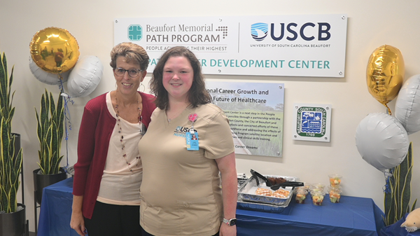 Wurster next to nursing student
