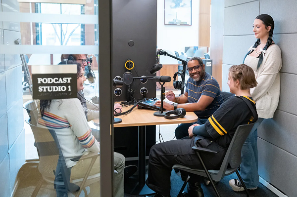 Voices of Mather podcast booth