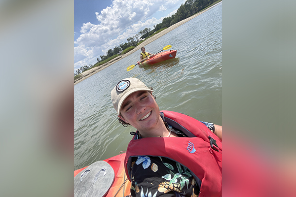 Toby Brock in a kayak Young man in a kayak