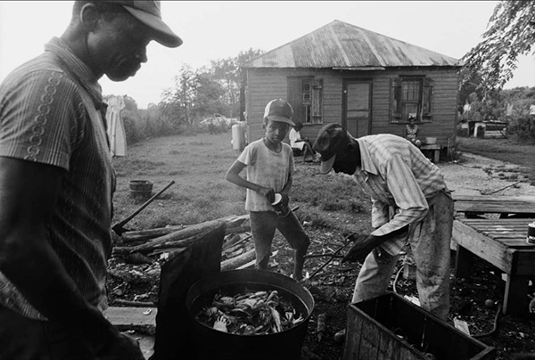 A crab boil outside a small house