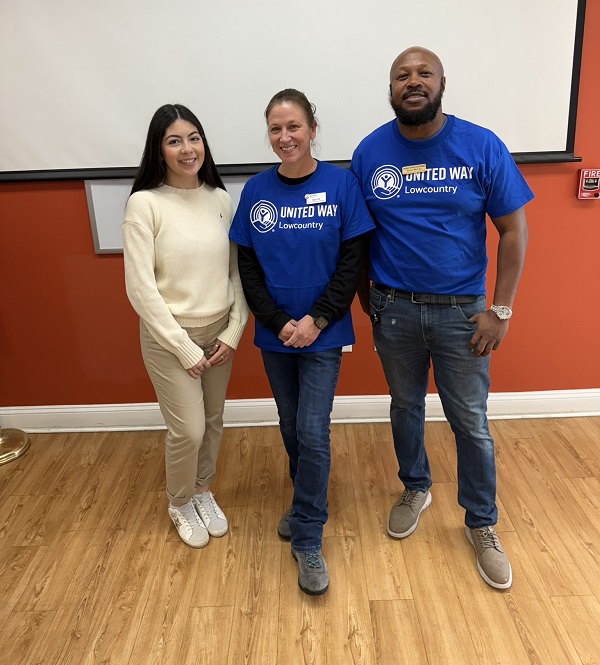 three people pose for a photo wearing shirts that say United Way Lowcountry